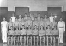 Black and white group photo of athletes with coaches